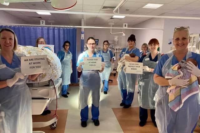 Staff in the Neonatal Intensive Care Unit at Peterborough City Hospital calling for people to stay at home. Photo: Peterborough City Hospital