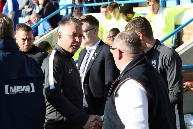 Posh boss Darren Ferguson with Gillingham manager Steve Evans.