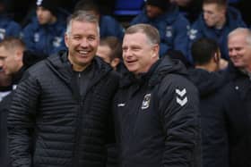 Posh manager Darren Ferguson (left) and Coventry City boss Mark Robins.