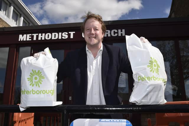 MP for Peterborough Paul Bristow   visiting the food bank at Dogsthorpe Methodist Church. EMN-200604-163030009