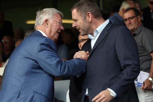 Posh chairman Darragh MacAnthony (right) with legendary manager Sir Alex Ferguson.