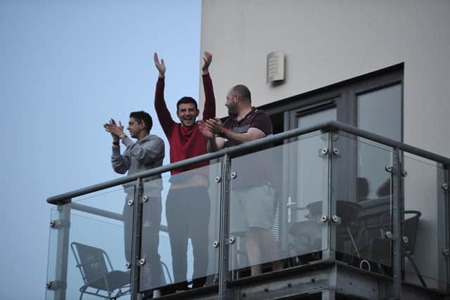 Residents clapping for the NHS in Potters Way, Fengate