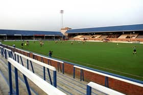 A scene from Posh v Kingstonian, an FA Cup first round replay staged behind closed doors at London Road in 1992.