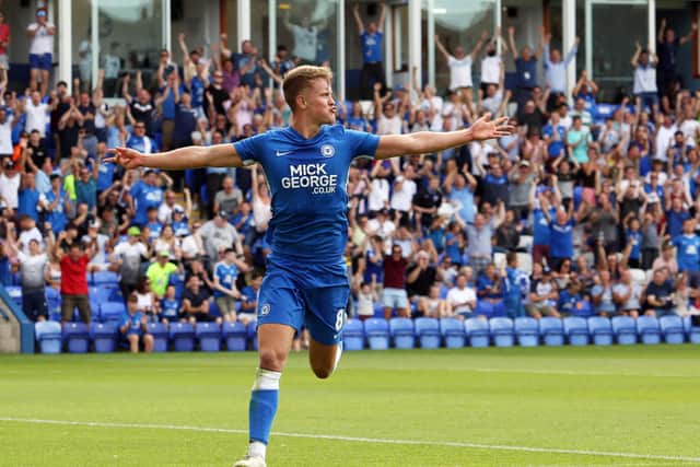 Mark O'Hara celebrates a debut goal for Posh.