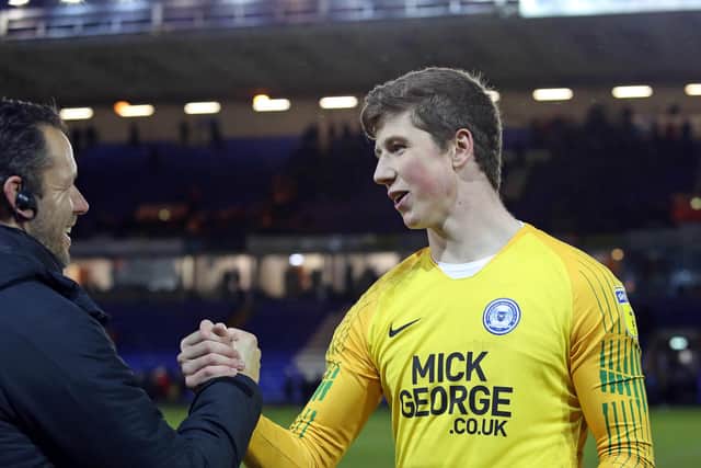 Conor O'Malley (right) with Posh goalkeeping coach Mark Tyler.