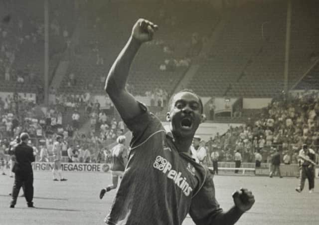 Noel Luke celebrates promotion with Posh at Wembley in 1992.