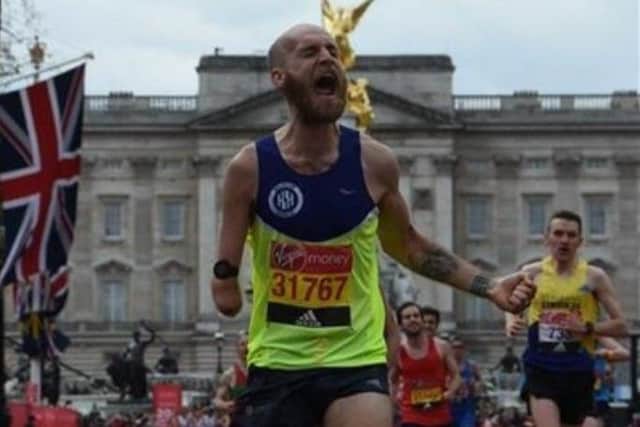 Thomas Musson finishes the London Marathon.