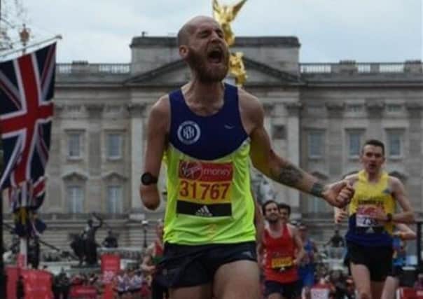 Thomas Musson finishes the London Marathon.