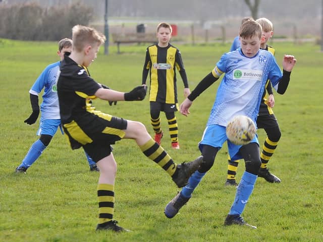 Crowland Blacks (yellow) and Hampton Robins have had their hopes of promotion from the Junior Alliance Under 12 League dashed.
