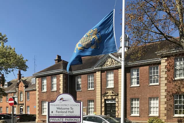 The Fenland District Council flag at half mast
