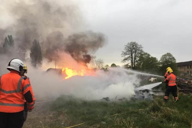 Firefighters tackling the blaze at the former RAF Upwood site. Photo: Cambridgeshire Fire and Rescue Service