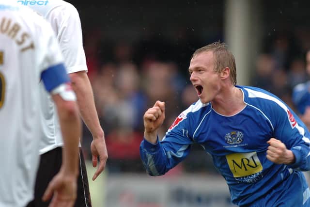 Dean Keates celebrates his promotion-clinching goal at Hereford.
