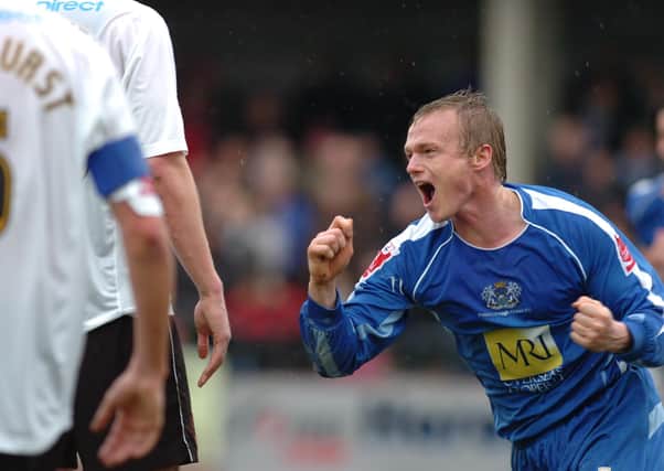 Dean Keates celebrates his promotion-clinching goal at Hereford.