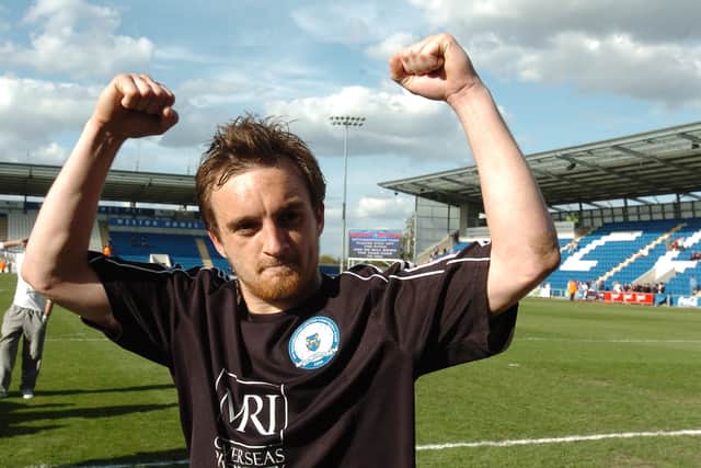 Charlie Lee celebrates promotion at Colchester
