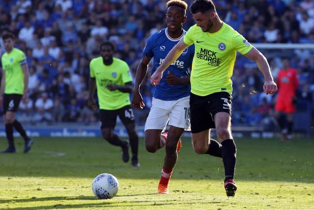Andrew Hughes in action for Posh.
