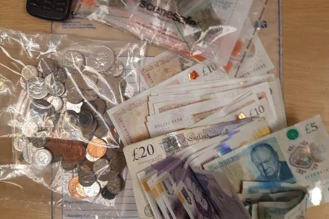 Police seized cash and drugs