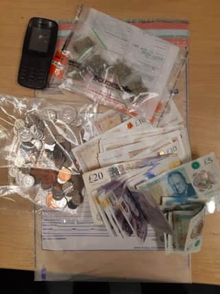 Police seized cash and drugs