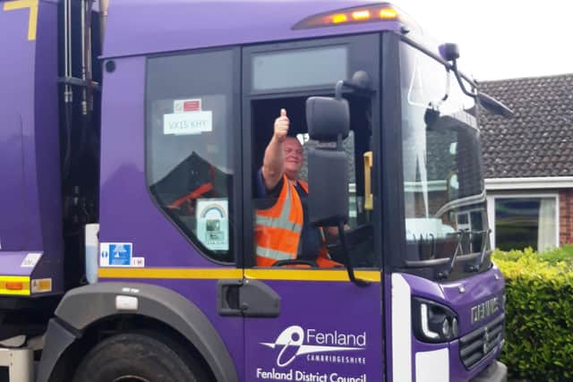 A thumbs up from refuse vehicle driver Matt Prentice