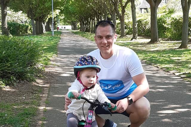 Gavin with his daughter Eleanor at the end of a run