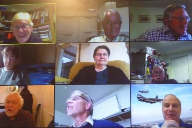 Rotary Club members meeting over Zoom