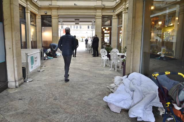 A rough sleeper in St Peter's Arcade in Peterborough