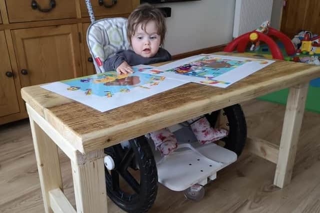 Little Charlotte at her hand-built desk