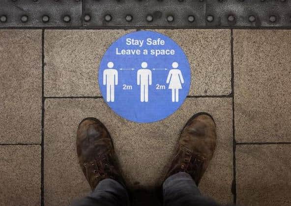 A social distancing sticker is seen on an underground station platform (Photo: Leon Neal/Getty Images)