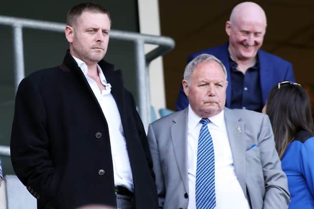 Posh chairman Darragh MacAnthony (left) with director of football Barry Fry.