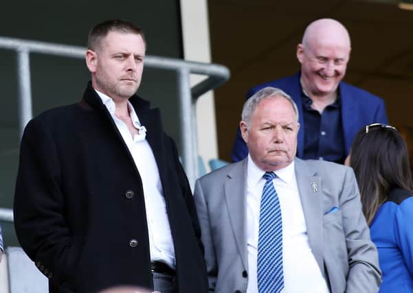 Posh chairman Darragh MacAnthony (left) with director of football Barry Fry.