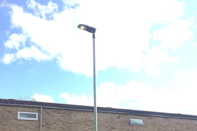 A street light remaining on during the day in Odecroft, Ravensthorpe