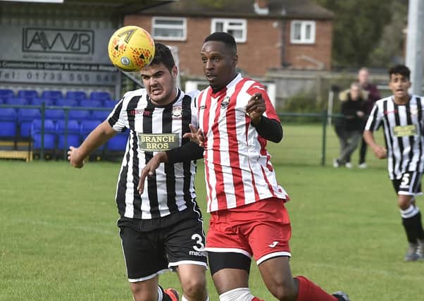 Peterborough Northern Star (black and white stripes) in action.