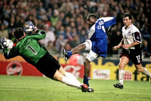 Posh striker Andy Clarke scores the only goal of the play-off final against Darlington.