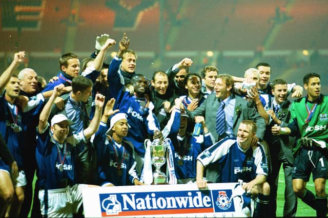 Posh players celebrate their Play-off final success at Wembley.