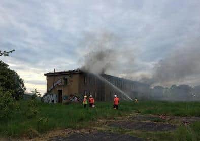 Firefighters putting out the blaze at the former RAF Upwood site. Photo: Cambridgeshire Fire and Rescue Service