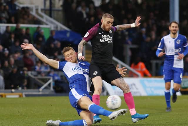Marcus Maddison in action for Posh