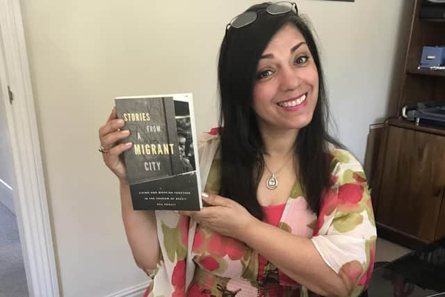 Parveen with the new book by Ben Rogaly.