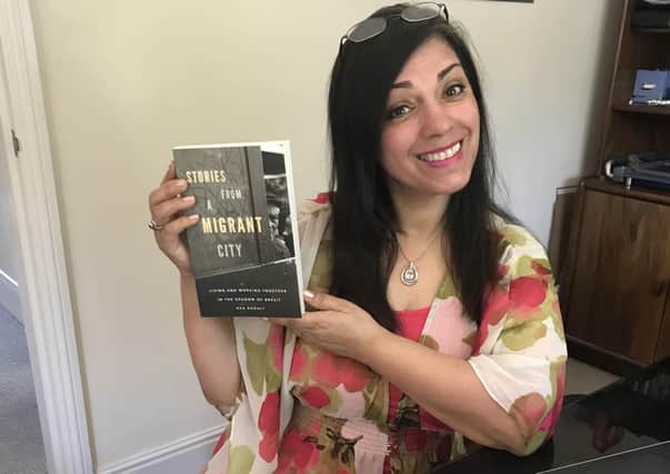 Parveen with the new book by Ben Rogaly.
