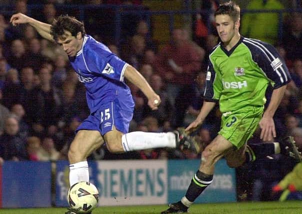 Posh defender Adam Drury (right) in action against Chelsea's Gianfranco Zola in an FA Cup tie at Stamford Bridge in 2001.