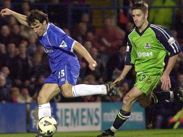 Posh defender Adam Drury (right) in action against Chelsea's Gianfranco Zola in an FA Cup tie at Stamford Bridge in 2001.