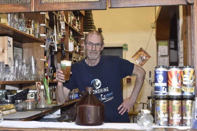 Bram Brammer and his take-a-way beer at the Hand in Heart pub, Highbury Street