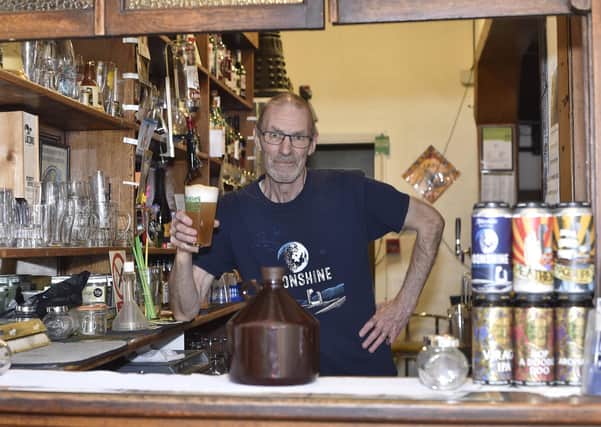 Bram Brammer and his take-a-way beer at the Hand in Heart pub, Highbury Street