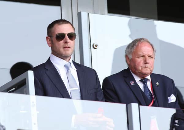 Posh chairman Darragh MacAnthony (left) and director of football Barry Fry have to wait another week before learning their club's fate.