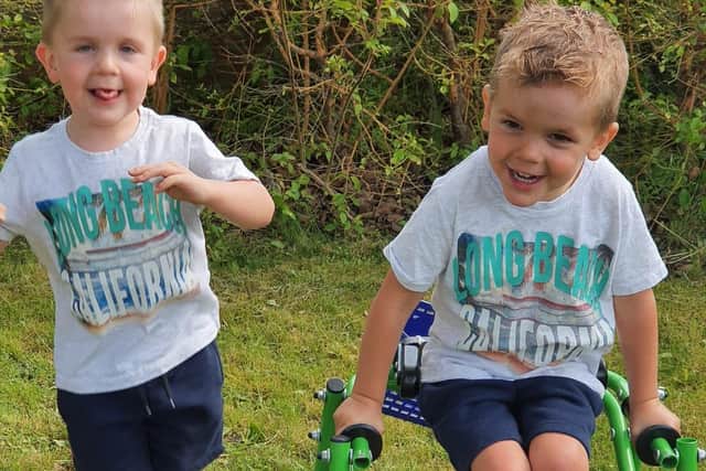 Arlie (right) with twin brother Kobi
