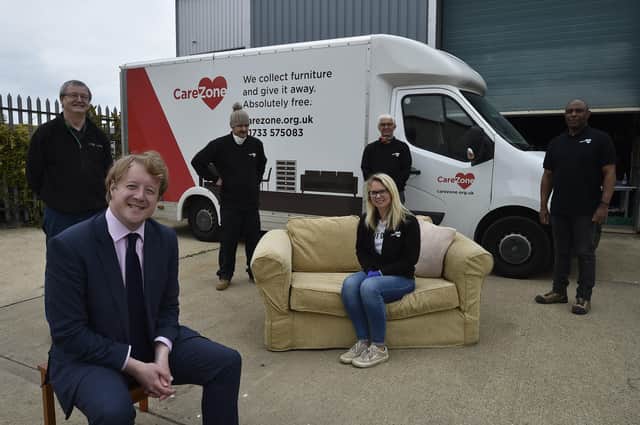 Paul Bristow MP for Peterborough with  Leanne Waterman and staff from Kingsgate Community Church who are handing out furniture to former homeless. EMN-200806-215951009