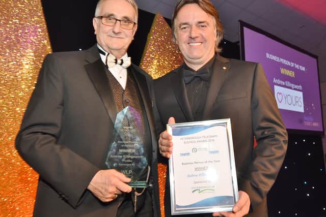 Andrew Killingsworth, right, receives the Peterborough Telegraph Business Awards 2016 from Councillor John Holdich. EMN-161126-003350009
