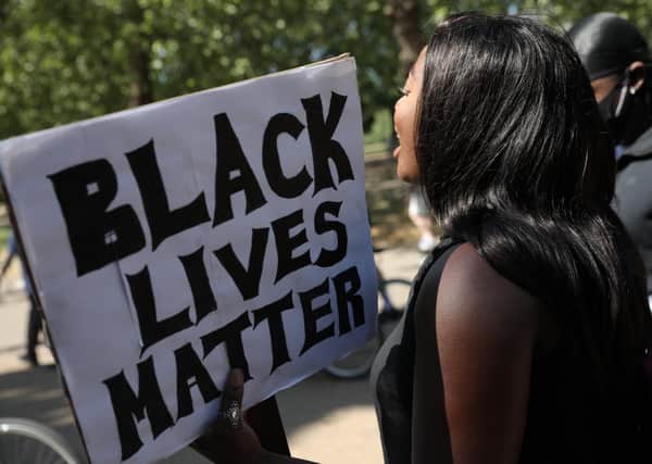 Protesters take part in a 'Black Lives Matter' demonstration on June 01, 2020 in London. (Photo by Dan Kitwood/Getty Images)