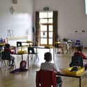 Pupils at work in a socially distanced classroom at Heritage Park primary school, Stanground