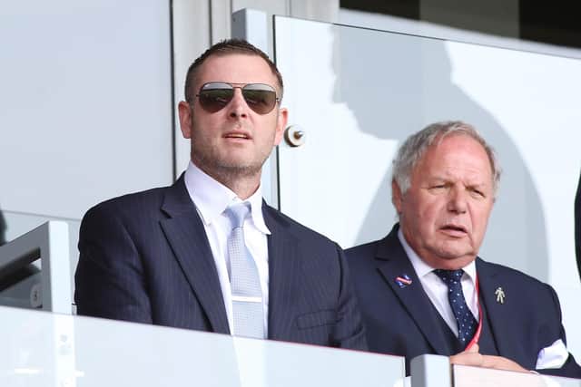 Posh chairman Darragh MacAnthony (left) and director of football Barry Fry.