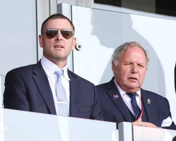 Posh chairman Darragh MacAnthony (left) and director of football Barry Fry.