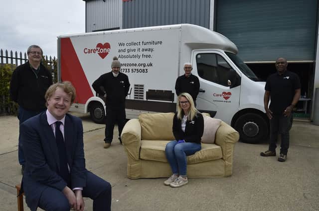 Paul Bristow MP for Peterborough with  Leanne Waterman and staff from Kingsgate Community Church who are handing out furniture to former homeless. EMN-200806-220003009